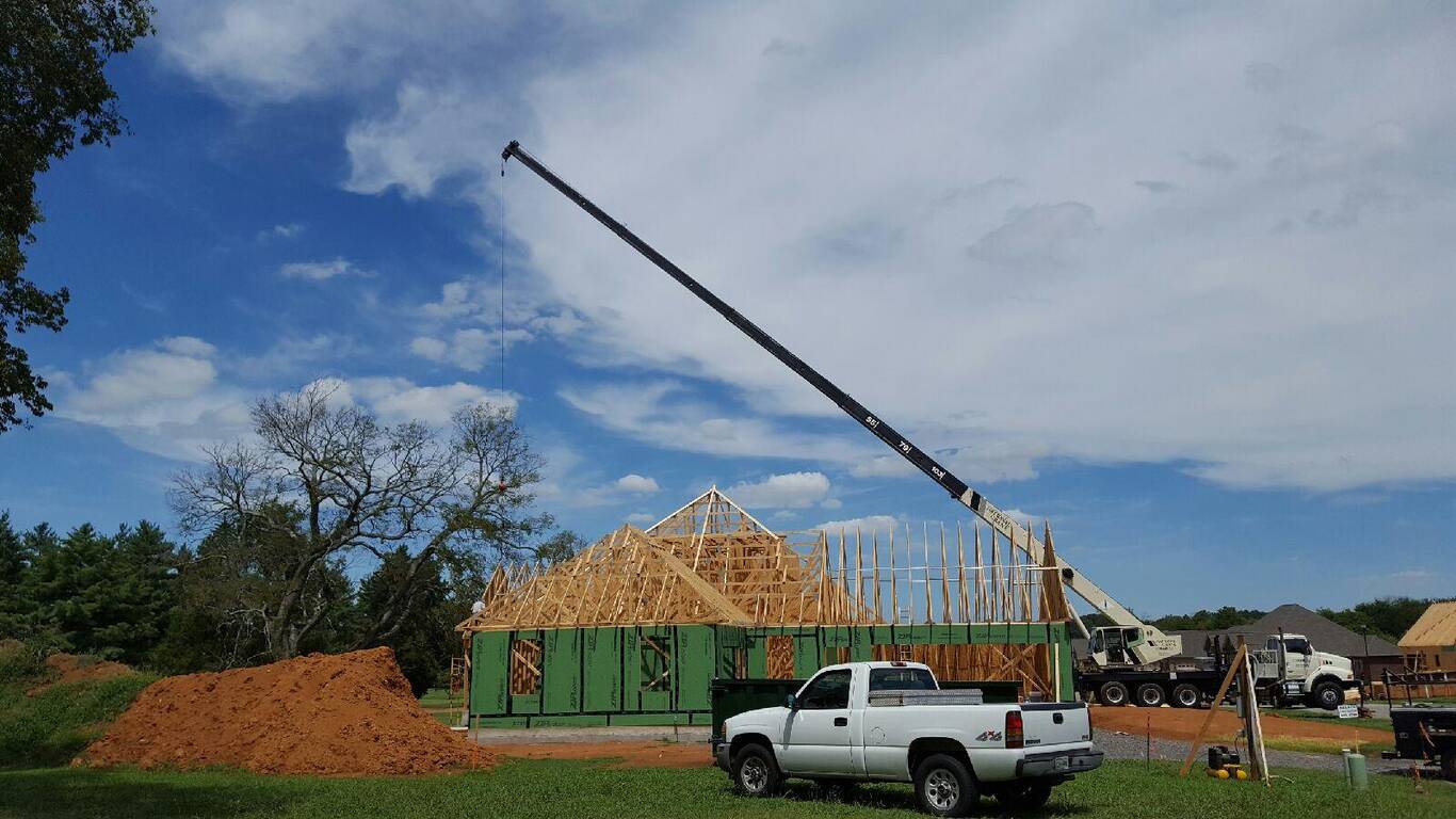 Crane truck on a framing site