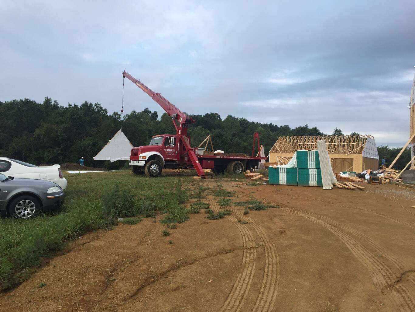 Crane lift at a two-story framing